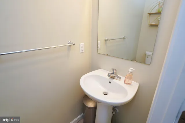 a view of hallway with washer and dryer