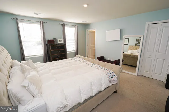 a bathroom with a shower and a toilet