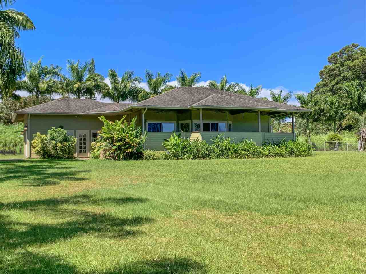 90 Kaupakalua Road Haiku, HI 96708 - Photo 2 of 30 a view of a house with a garden