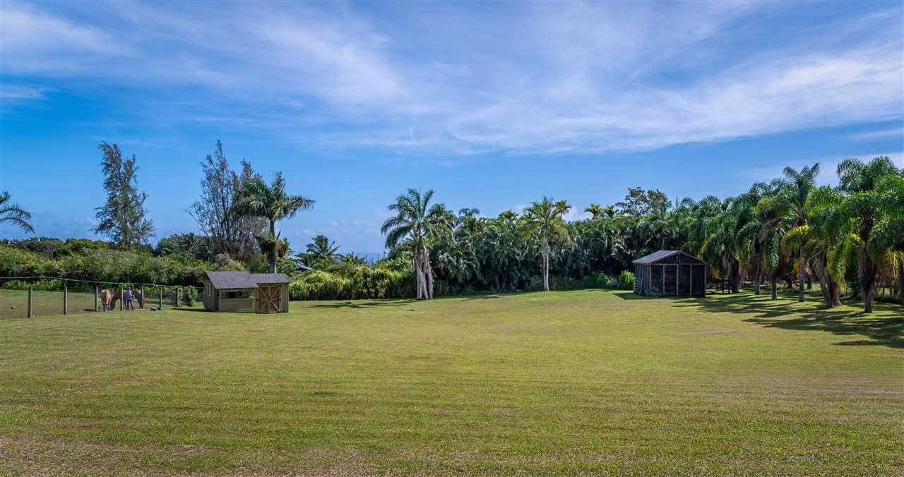 90 Kaupakalua Road Haiku, HI 96708 - Photo 27 of 30 a view of a lake with houses in the background