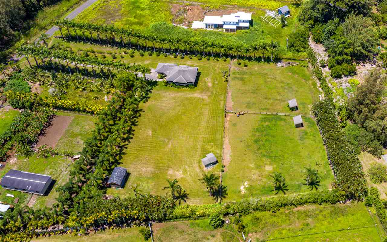 90 Kaupakalua Road Haiku, HI 96708 - Photo 29 of 30 an aerial view of residential houses with swimming pool