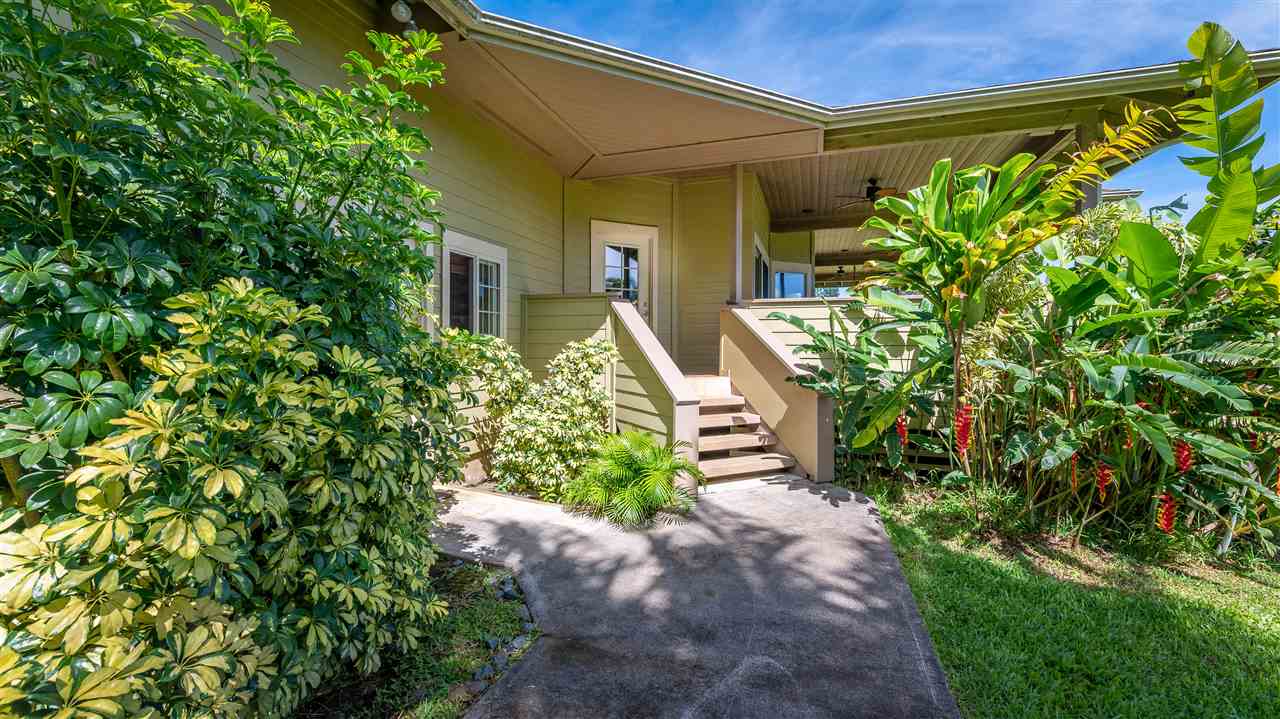 90 Kaupakalua Road Haiku, HI 96708 - Photo 5 of 30 a view of a house with a flower garden