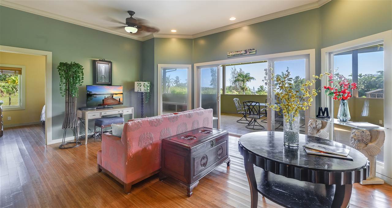 90 Kaupakalua Road Haiku, HI 96708 - Photo 7 of 30 a view of a dining room with furniture window and wooden floor