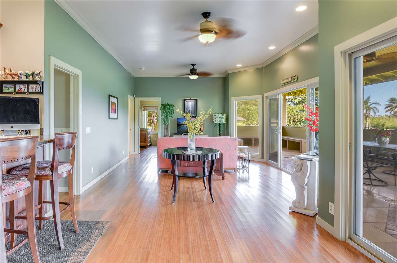 90 Kaupakalua Road Haiku, HI 96708 - Photo 10 of 30 a view of a dining room with furniture and wooden floor