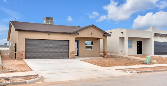 a view of a house with a patio