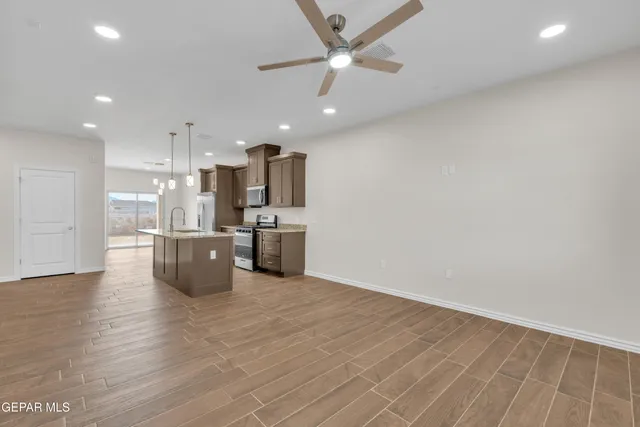a view of kitchen with wooden floor