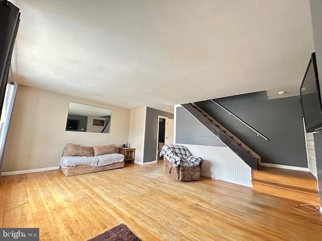 12405 Sweet Briar Road Philadelphia, PA 19154 - Photo 12 of 28 a bedroom with a bed and wooden floor