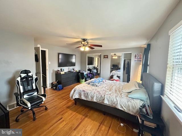 12405 Sweet Briar Road Philadelphia, PA 19154 - Photo 14 of 28 a bedroom with a bed and large windows