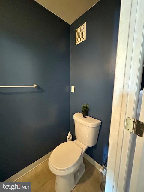 12405 Sweet Briar Road Philadelphia, PA 19154 - Photo 23 of 28 a white toilet sitting next to a bathroom sink