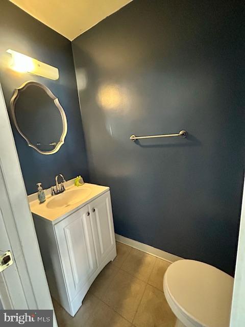 12405 Sweet Briar Road Philadelphia, PA 19154 - Photo 24 of 28 a bathroom with a toilet sink and mirror