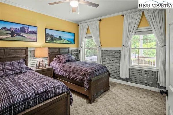 a bathroom with a sink a mirror and a shower