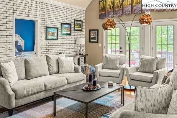 a bedroom with a large bed and a couch