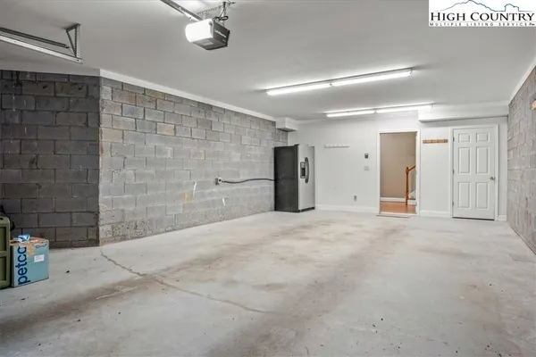 a view of a chairs on wooden deck