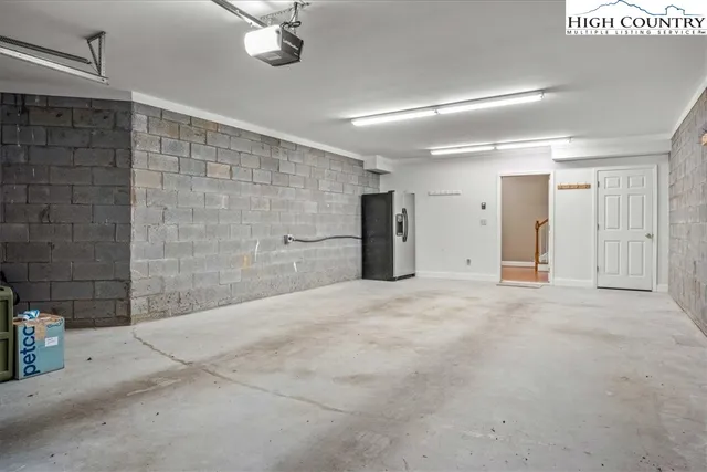 a view of a chairs on wooden deck