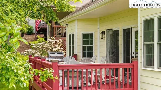 an aerial view of a house with a yard basket ball court and outdoor seating