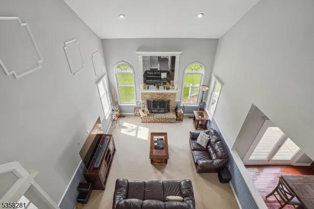 a view of kitchen with furniture and wooden floor