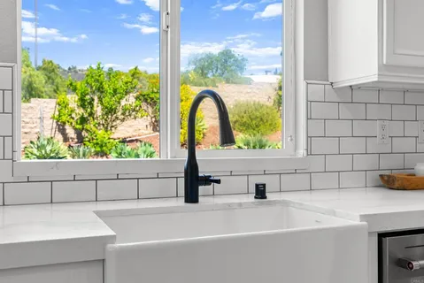 a bathroom with a bathtub and a sink