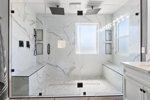 a bathroom with a sink and mirror