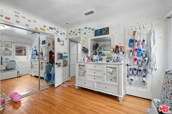 a room with furniture and a flat screen tv
