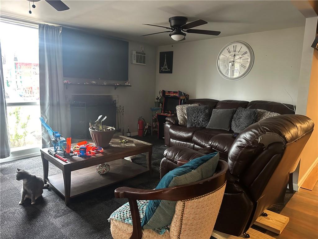 123 Spring Street Stockbridge, GA 30281 - Photo 13 of 47 a living room with furniture and a window