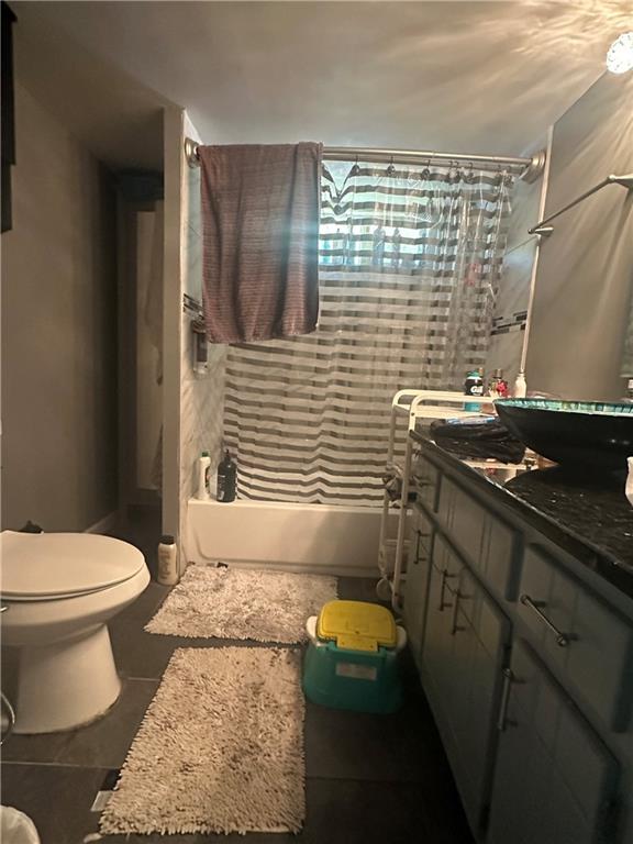 123 Spring Street Stockbridge, GA 30281 - Photo 17 of 47 a bathroom with a sink toilet and shower