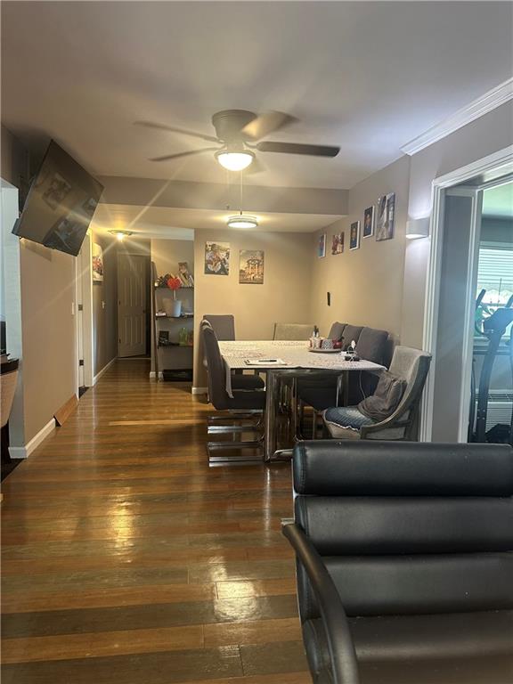 123 Spring Street Stockbridge, GA 30281 - Photo 25 of 47 a living room with furniture and a view of kitchen