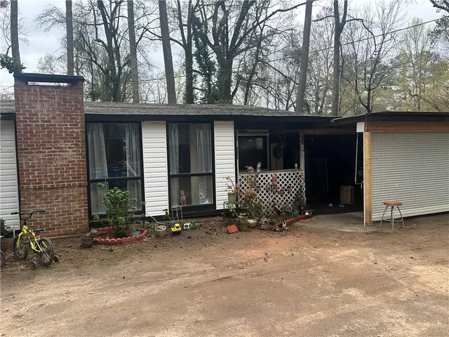 a front view of a house with garage