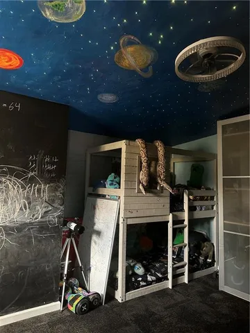 a kitchen with a sink and a refrigerator