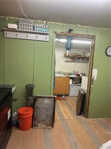 a room with a bench and trees