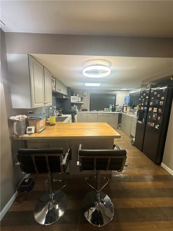 123 Spring Street Stockbridge, GA 30281 - Photo 9 of 47 a room with furniture and air hockey table