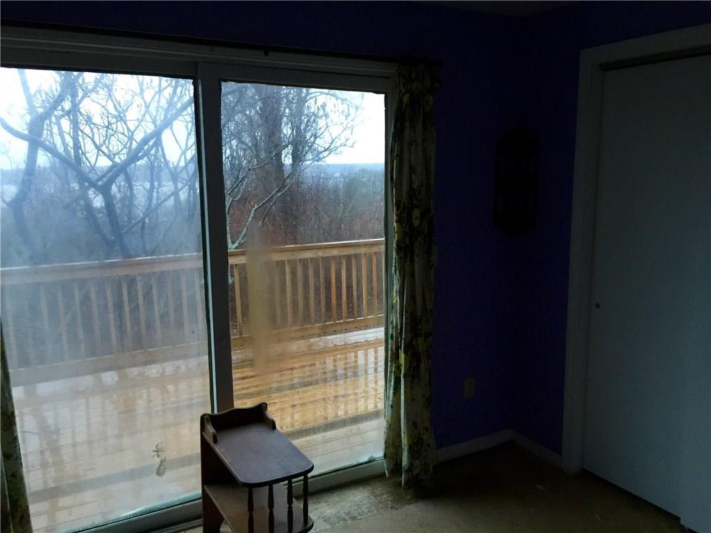 14 Tower Hill Road Orrs Island, ME 04066 - Photo 21 of 33 Apartment bedroom with slider to deck.