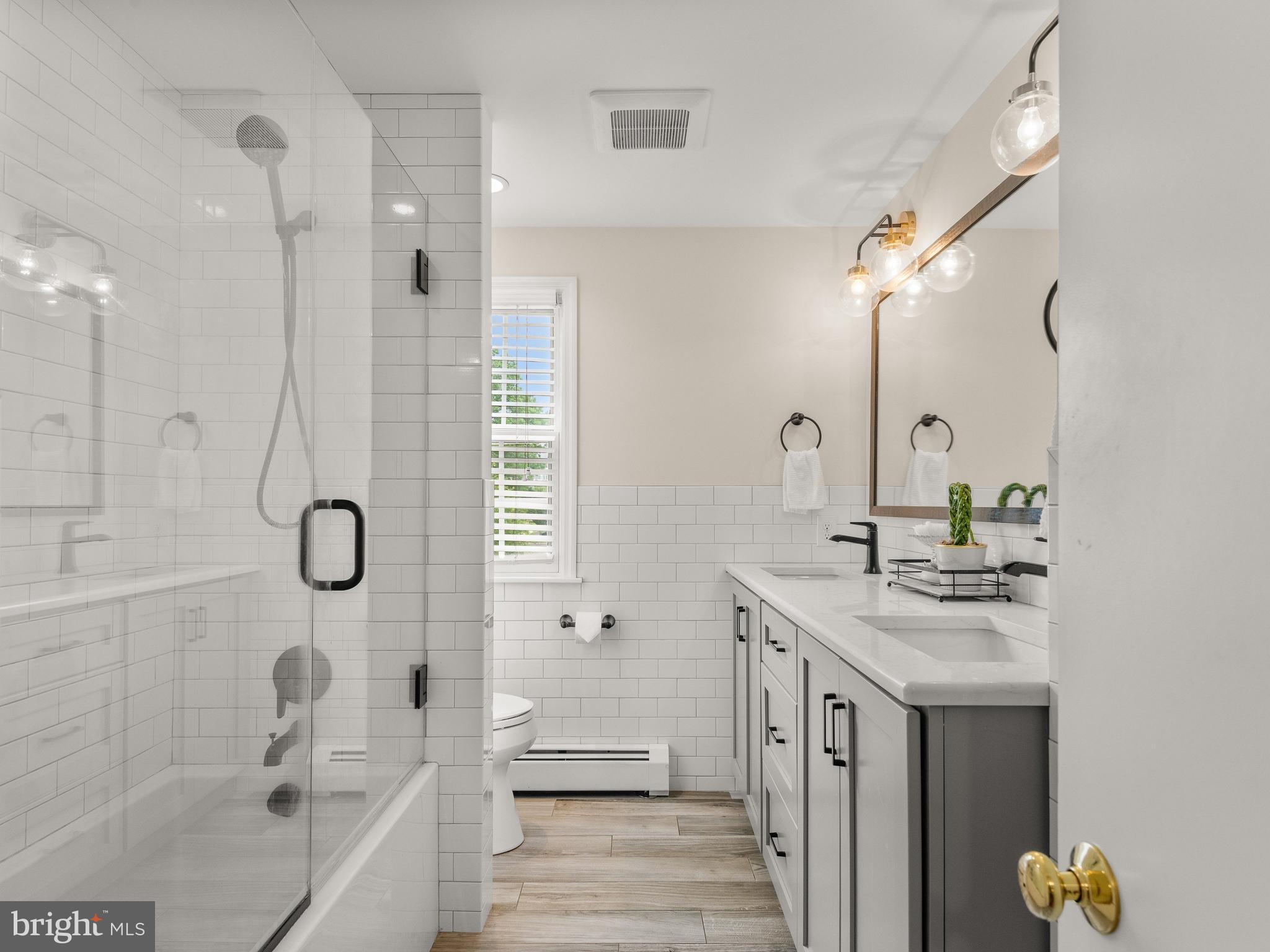 2 Porteous Road Berwyn, PA 19312 - Photo 28 of 38 Hall bathroom with double vanity