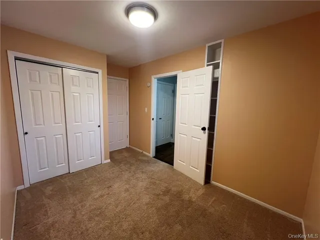 an empty room with closet