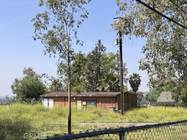 425 Arrowhead Road San Bernardino, CA 92404 - Photo 3 of 10 a view of swimming pool with trees in the background