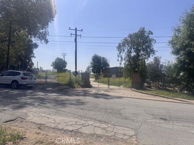 425 Arrowhead Road San Bernardino, CA 92404 - Photo 4 of 10 a view of a street with a cars on the road