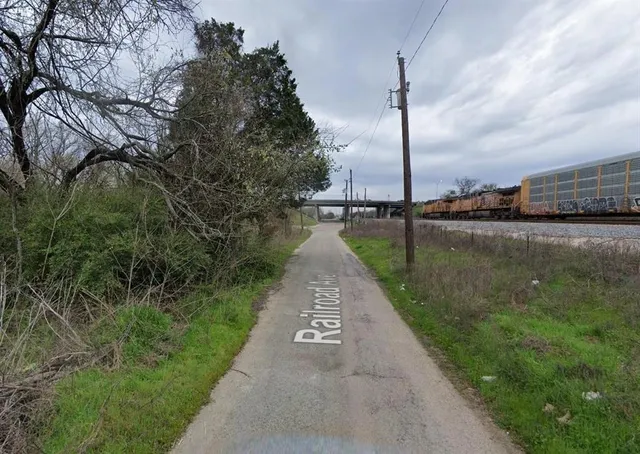 a view of a lake with a yard