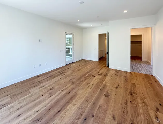 a view of an empty room and window