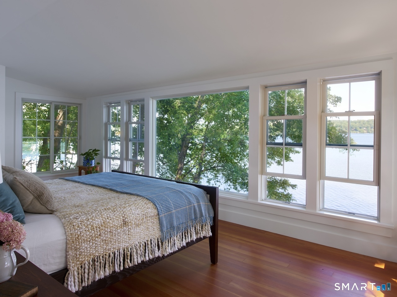 63 Old Cne Road Salisbury, CT 06039 - Photo 37 of 39 a bedroom with a bed and a large window