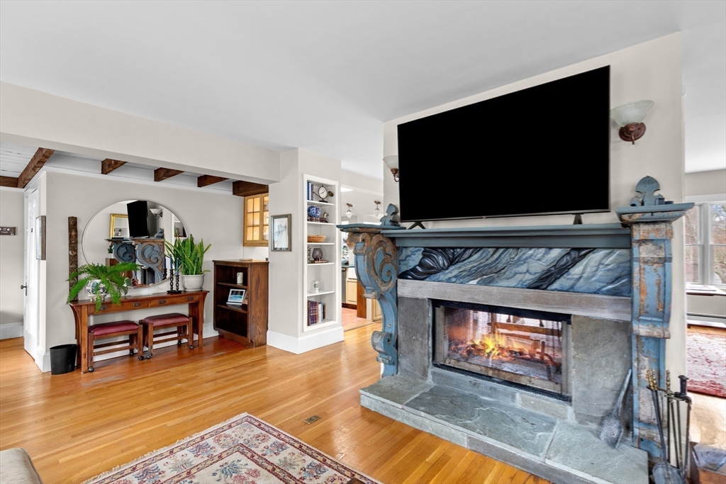 30 South River Street Wellesley, MA 02482 - Photo 17 of 29 a living room with furniture and a flat screen tv