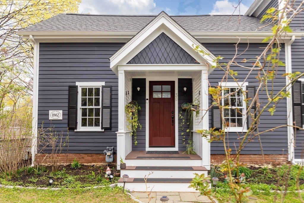 30 South River Street Wellesley, MA 02482 - Photo 27 of 29 front view of a house with a yard