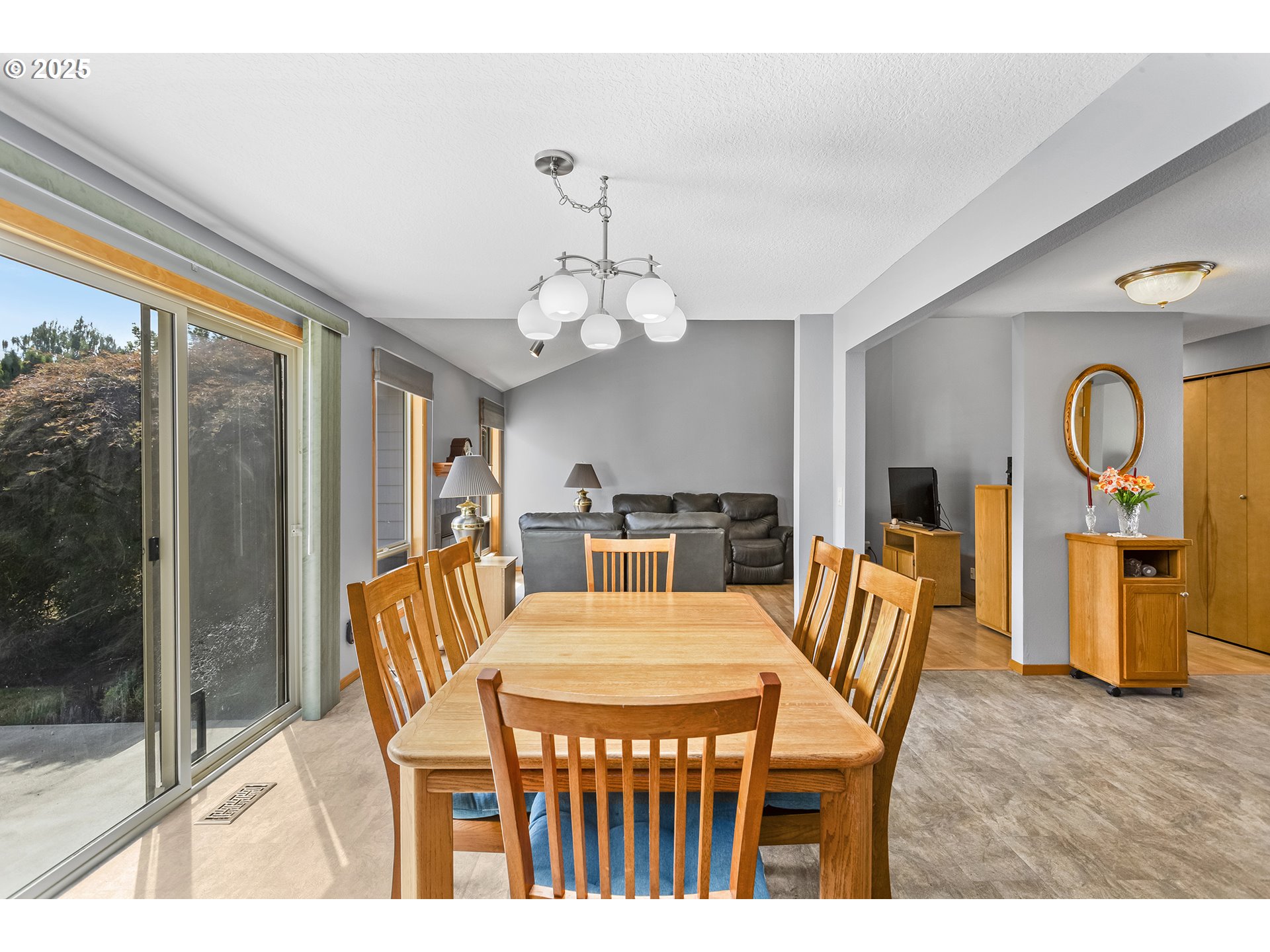 9630 Southwest Robbins Drive Beaverton, OR 97008 - Photo 14 of 35 a view of a dining room with furniture window and wooden floor