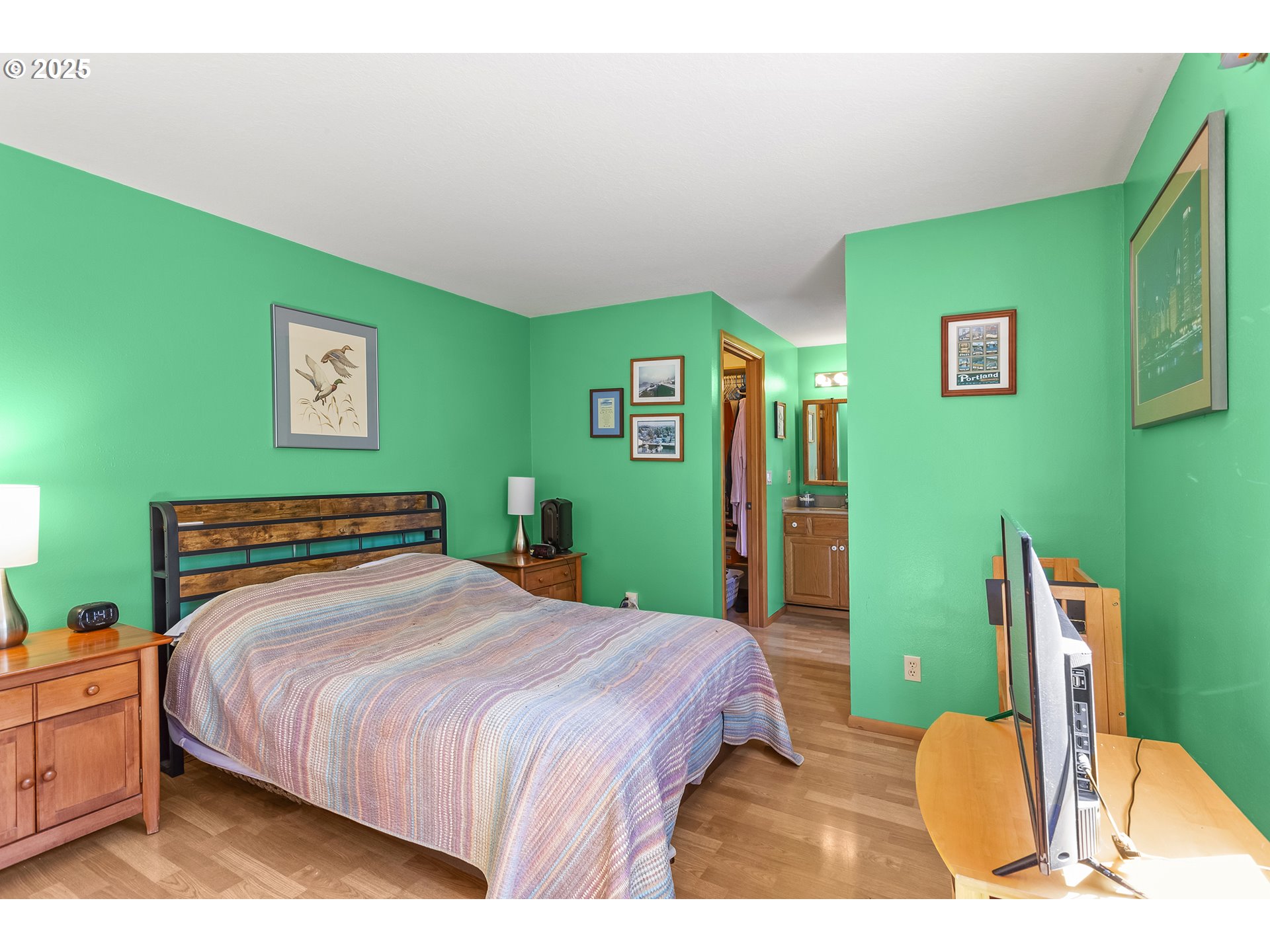 9630 Southwest Robbins Drive Beaverton, OR 97008 - Photo 17 of 35 a bedroom with a bed and dresser