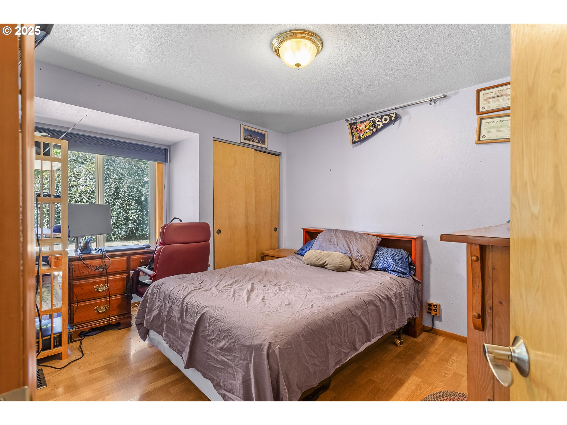 9630 Southwest Robbins Drive Beaverton, OR 97008 - Photo 21 of 35 a bedroom with a bed and with furniture