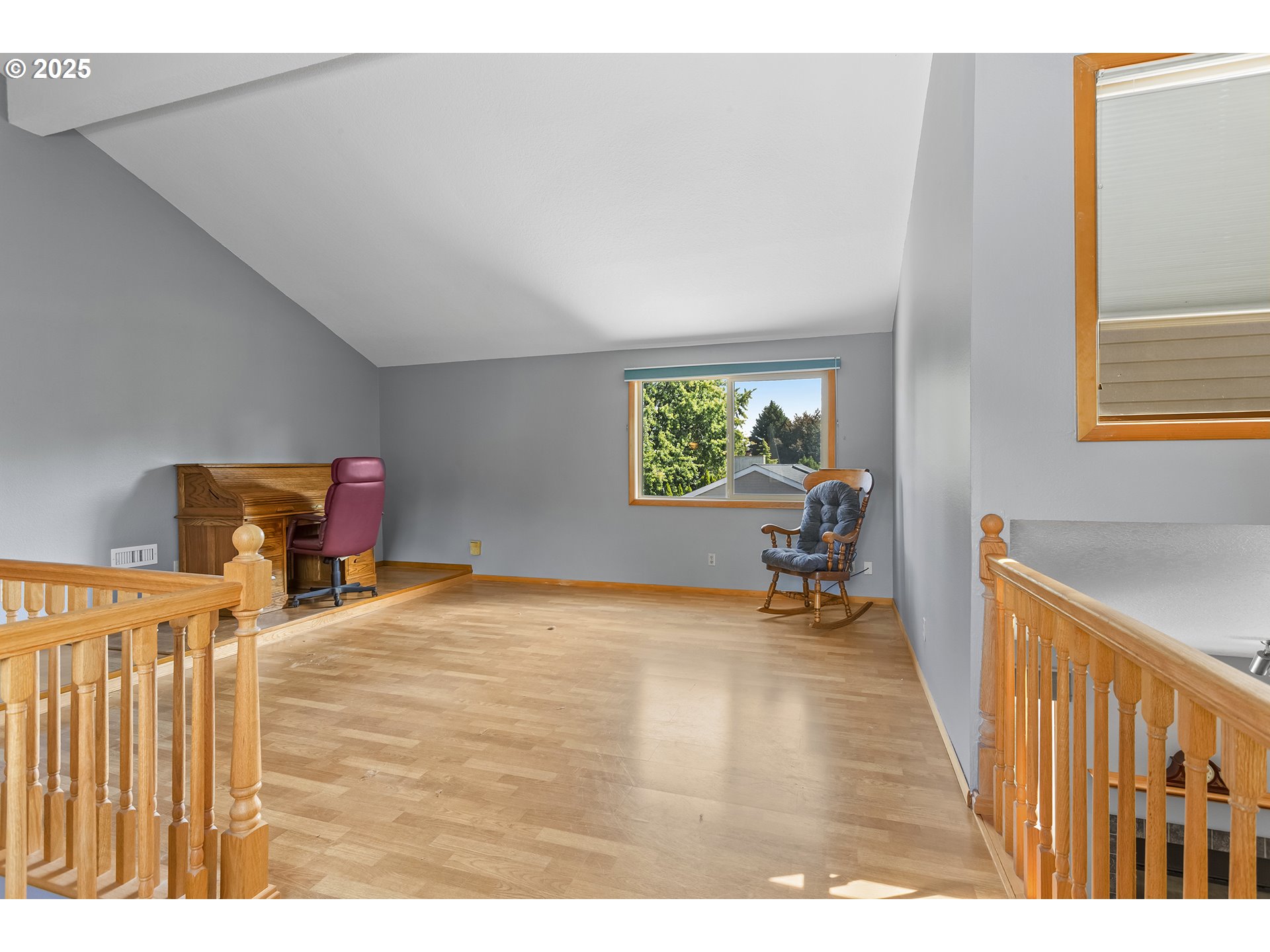 9630 Southwest Robbins Drive Beaverton, OR 97008 - Photo 23 of 35 a bed room with a bed and a chair