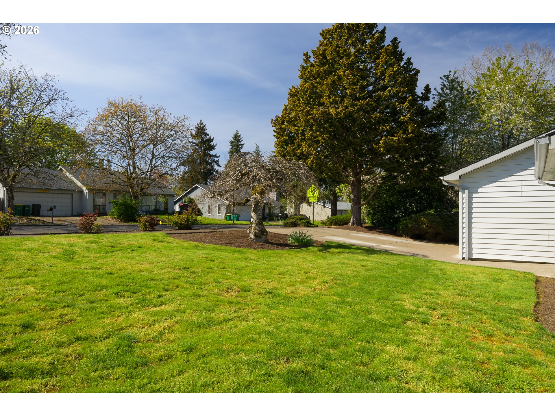 9630 Southwest Robbins Drive Beaverton, OR 97008 - Photo 28 of 35 a house view with swimming pool in front of it