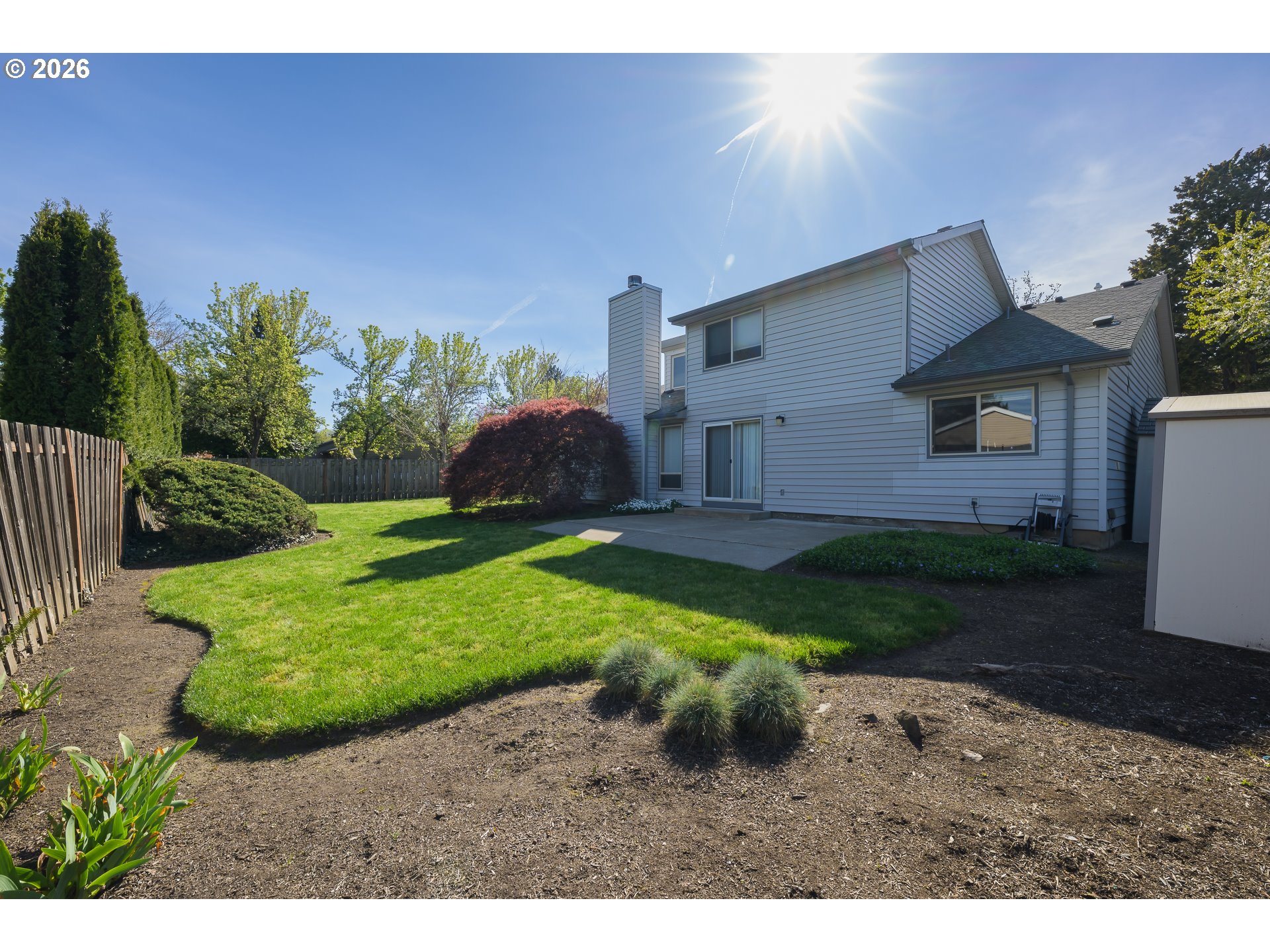 9630 Southwest Robbins Drive Beaverton, OR 97008 - Photo 34 of 35 a view of a backyard with potted plants