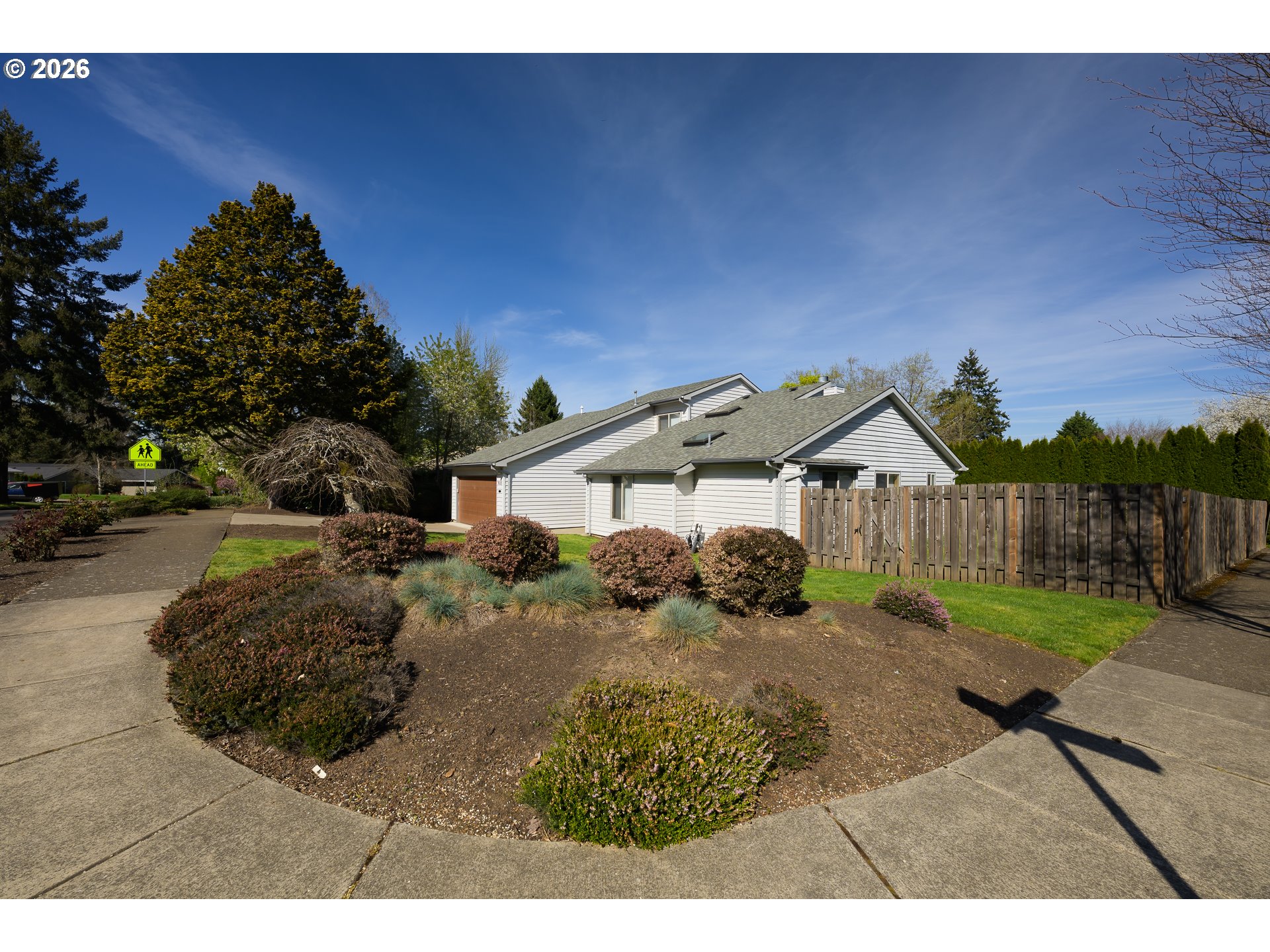 9630 Southwest Robbins Drive Beaverton, OR 97008 - Photo 35 of 35 a view of a house with a yard