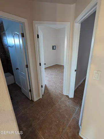 a view of a livingroom from a hallway