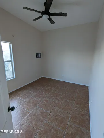 a view of empty room with windows