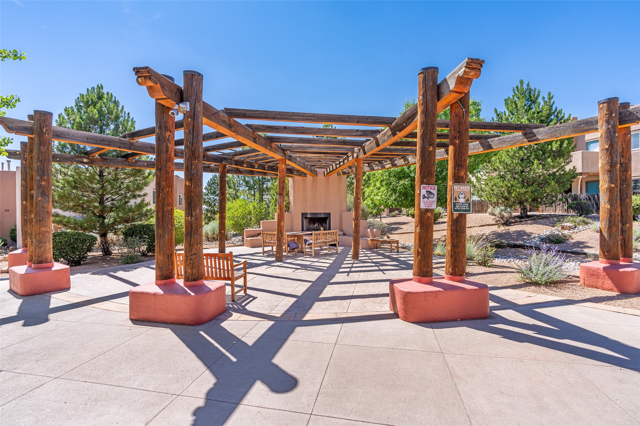 2210 Miguel Chavez Road, Unit 1423 Santa Fe, NM 87505 - Photo 20 of 26 outdoor fireplace gathering
